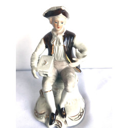PAREJA DE FIGURAS DE PORCELANA  MARRÓN